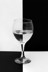 Wine glass on black and white backlight