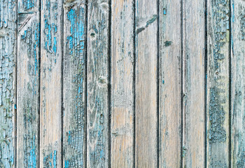 Fototapeta na wymiar Old wood planks with paint peeling off.