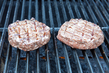hamburger patties on grill