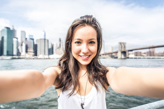Woman taking selfie in New york