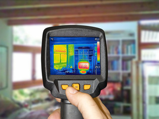 Recording heated TV and a window in the living room, with thermal camera