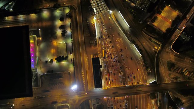 Hong Kong Aerial v127 Flying over Cross Harbour Tunnel entrance looking down vertically at night 2/17