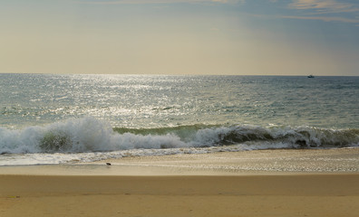 Beach scene in Nags Head NC sunrise on a clear blue day