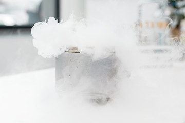 Close-up view of scientific experiment with steam in chemical laboratory