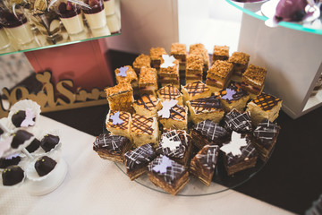 Different kinds of baked sweets on a buffet