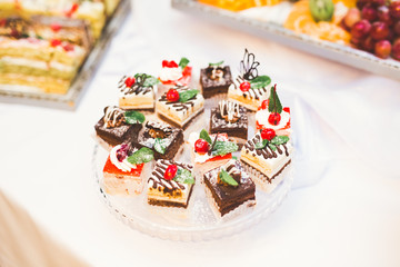 Different kinds of baked sweets on a buffet