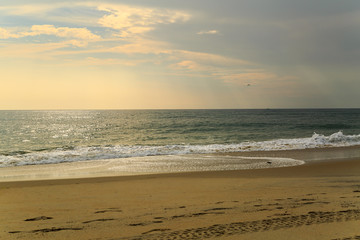 Beach scene in Nags Head NC sunrise on a clear blue day