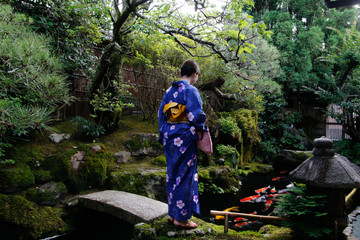japanese young woman kimono in japanese garden