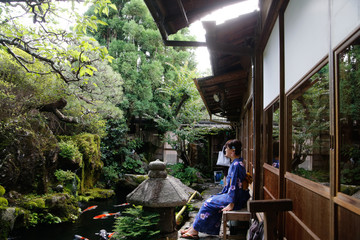 japanese young woman kimono in japanese garden