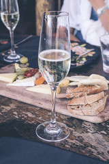 Close up of a glass of champagne in cafe, Bali island, Indonesia.