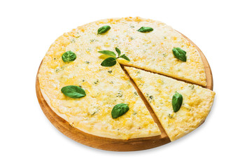 Delicious four cheese pizza with basil leaves