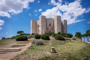 Castel del Monte, the famous castle built in an octagonal shape by the Holy Roman Emperor Frederick II in the 13th century in Andria. Apulia, southeast Italy - obrazy, fototapety, plakaty