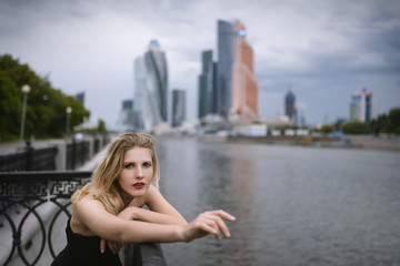 Outdoors portrait of beautiful young woman. Selective focus.