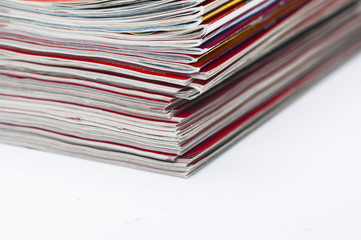stacked magazines newspaper