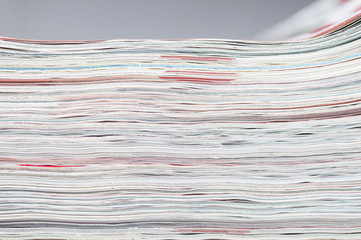 stacked magazines newspaper