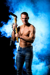 fitness muscular male model with axe