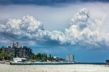 Fototapeta premium Clouds over the beach