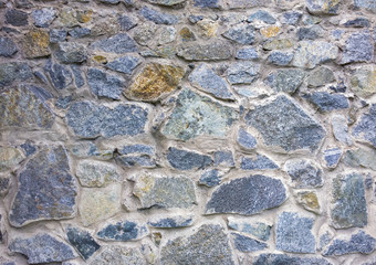 Stone wall texture. Cobblestone background. Ancient fortress wall
