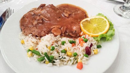 Rice with meat soup and vegetables background.