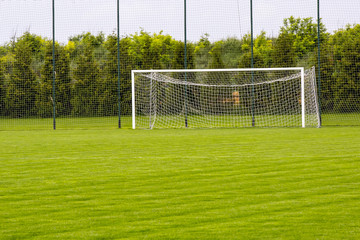 A soccer goal on the grass
