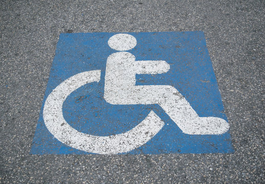 Handicapped parking spot - Disability symbol painted on the floor