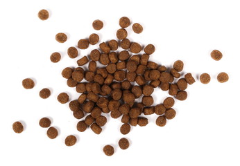 Dry dog food isolated on white background, top view