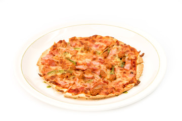 Delicious pizza inside dish isolated