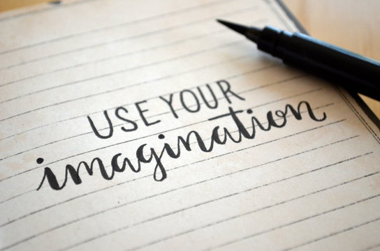 USE YOUR IMAGINATION hand-lettered in notebook