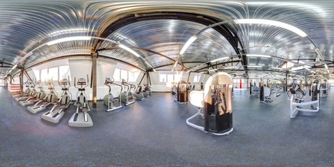 Lightfull sunny modern big huge fitness hall gym with black and blue floor full 360 degree panorama in equirectangular spherical projection