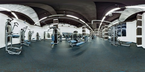 Modern big empty fitness gym with sport exercise equipment full 360 degree panorama in equirectangular spherical projection