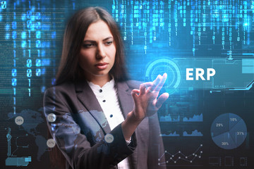 The concept of business, technology, the Internet and the network. A young entrepreneur working on a virtual screen of the future and sees the inscription: ERP