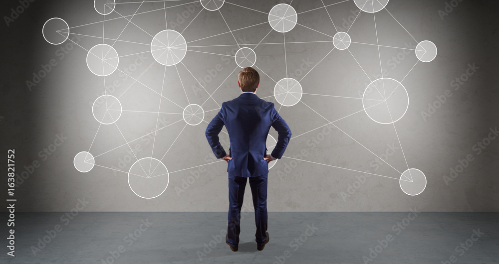 Aufkleber businessman using social network interface on a wall 3d rendering