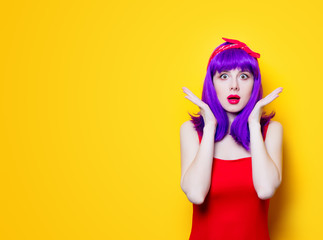 Portrait of young girl with purple color hair