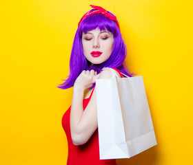 girl with purple color hair and shopping bag