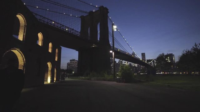 Dolly shot of The Brooklyn Bridge at night