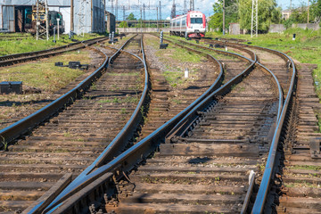 Fototapeta premium passenger train through a railway station in Poti, Georgia