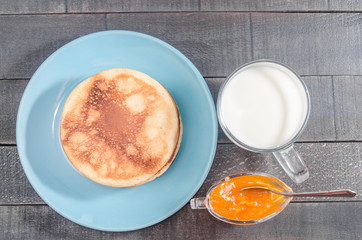 Small pancakes on a blue plate