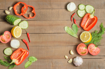 Fresh vegetables on a wooden background