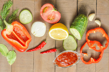 Fresh vegetables on a wooden background