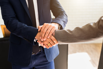 Businessman Shaking Hand After Finish Business Meeting in Conference Room