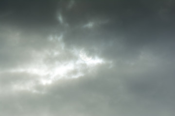 Fototapeta premium sunrise behind the clouds