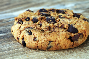 Chocolate cookies on wooden table. Chocolate chip cookies shot
