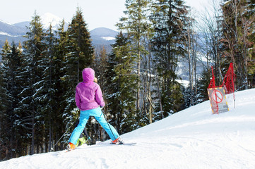 Skiing on the slope of mountains in winter in the Carpathians