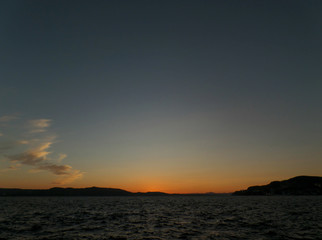 Fototapeta na wymiar Deep Blue and Orange Norwegian Sunset Sky over the North Sea in Bergen, Norway 