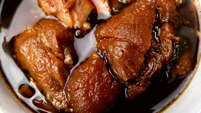  00:06 | 00:23 1&times;  Close up of Stewed Pork is delicious Thailand street food