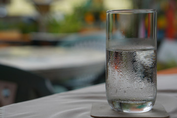 Glass of cold water in the restaurant