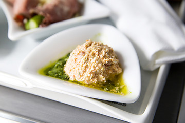 appetizer on the plate in airplane