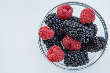 sweet dessert assorted berries in transparent bowl