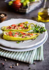  Green pepper stuffed with bacon, cheese, tomato and green onion