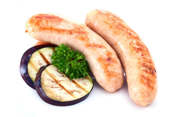 Grilled  bar-b-q sausages and eggplant closeup